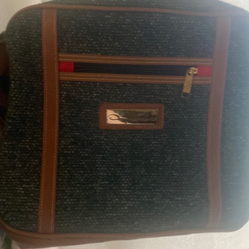Oscar de la Renta luxury shoulder Bag for travel and luggage.